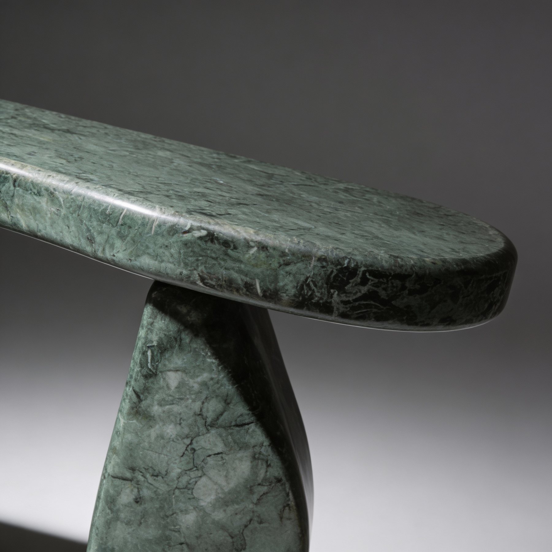 Arc Console, green marble console with a curved top resting on three arched legs