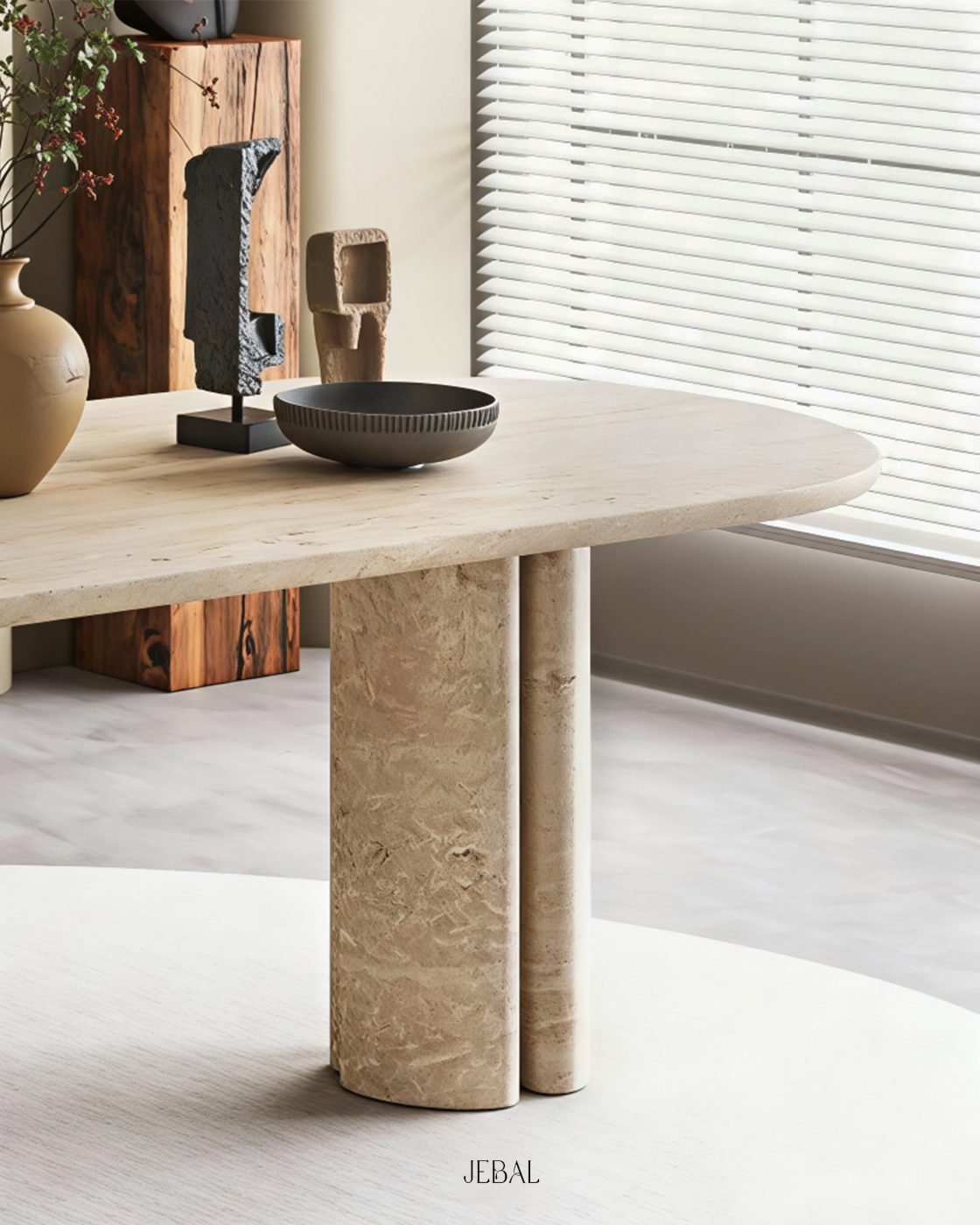 Classic travertine oval dining table in a sunlit room